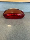 Polaris Sportsman 90, Outaw Rzr 170 Rear Taillight. 0454722 / 0452829 Oem Used. Price: $29.00.