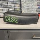 1980 1981 Kawasaki KDX80 Oem Rear Pan Complete Seat #2 Used. Price: $50.00.