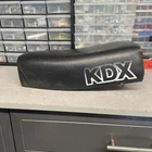 1980 1981 Kawasaki KDX80 Oem Rear Pan Complete Seat Used. Price: $50.00.
